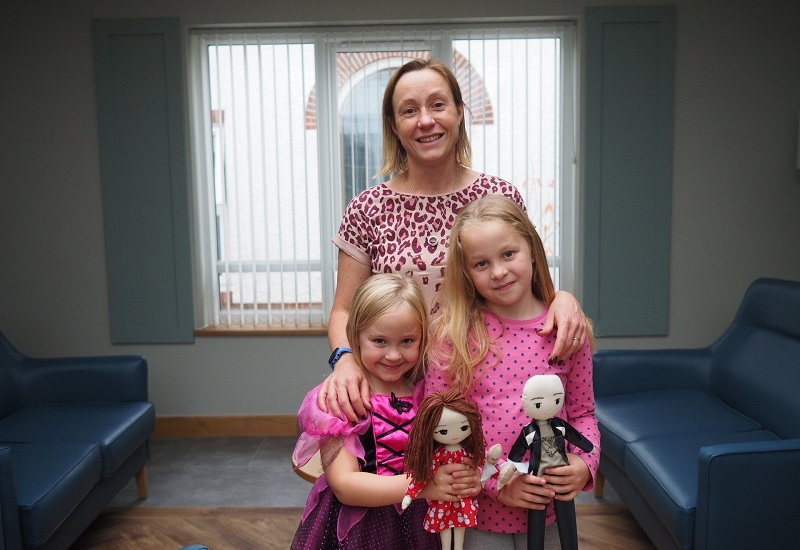 catherine-and-her-children-with-therapy-dolls