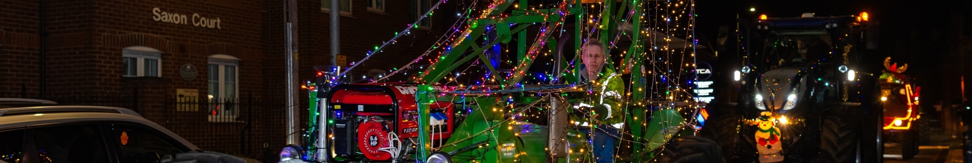 a-tractor-decorated-in-christmas-fairy-lights