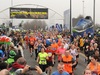 people-running-down-closed-roads-at-the-manchester-marathon
