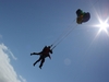 skydiver-and-instructor-opening-parachute