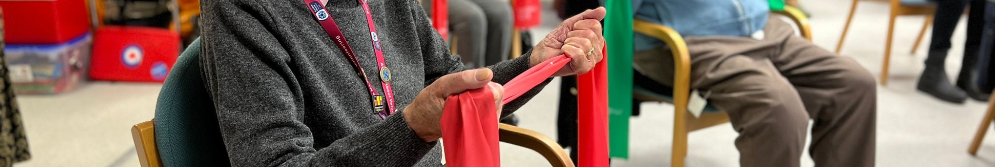 close-up-of-person-holding-an-exercise-band-at-our-wellbeing-hubs