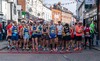 runners-line-up-at-start-of-hitchin-10k