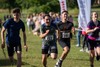 runners-smile-as-they-race-to-the-hitchin-triathlon-finish-line