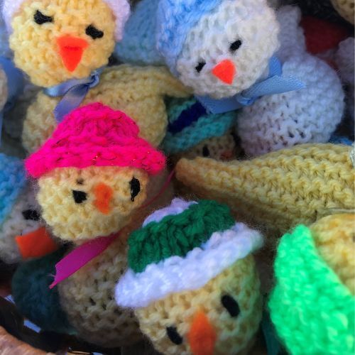 knitted-yellow-chicks-wearing-hats