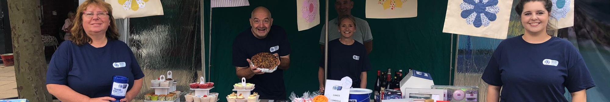 group-of-people-at-a-fundraising-stall