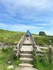 hiker-crossing-bridge-on-yorkshire-three-peaks-challenge