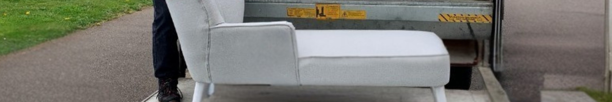 a-sofa-being-collected-and-loaded-onto-a-van