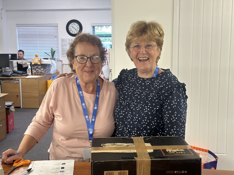 two-prep-and-pack-volunteers-smiling-at-the-camera
