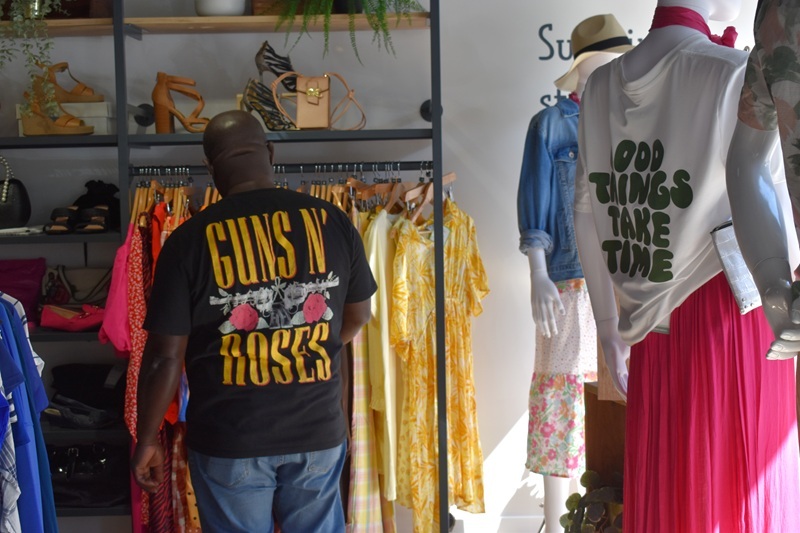 a-customer-browsing-preloved-clothing-at-our-letchworth-eastcheap-store
