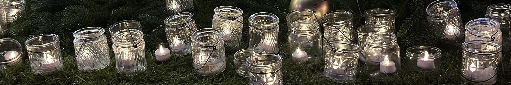 candles-placed-around-a-christmas-tree-at-lights-of-life