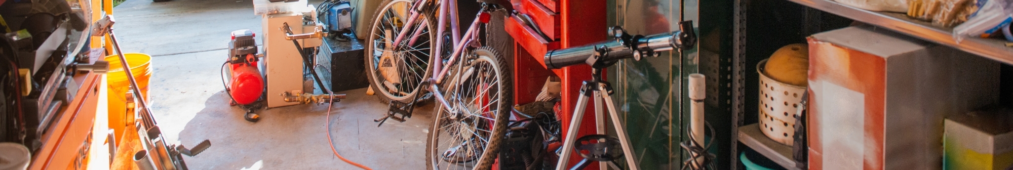 items-in-a-garage-including-a-bike-and-telescope