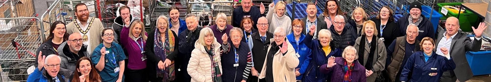 hospice-staff-volunteers-and-suppoters-inside-the-new-depot