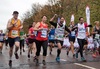 people-running-through-closed-off-road-in-london