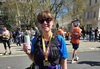 runner-wearing-a-team-garden-house-top-and-london-landmarks-medal