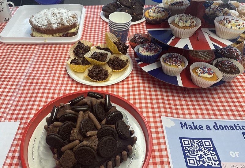 picnic-table-containing-a-range-of-cakes