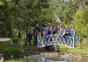 Group on the bridge in Swiss Garden. © The Shuttleworth Trust. Photo Darren Harbar