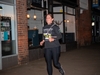 runner-passing-letchworth-shops-at-the-flawed-hero-marathon