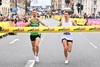 two-runners-about-to-cross-the-finish-line