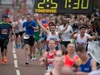 runners-crossing-finish-line-at-the-manchester-marathon