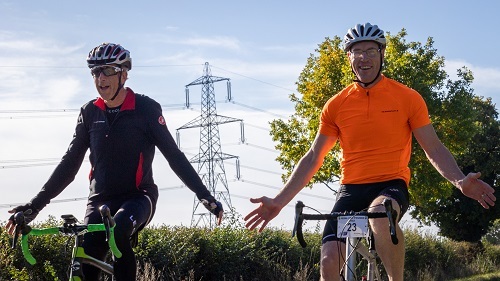 two-men-on-bikes-in-pedals-for-pounds