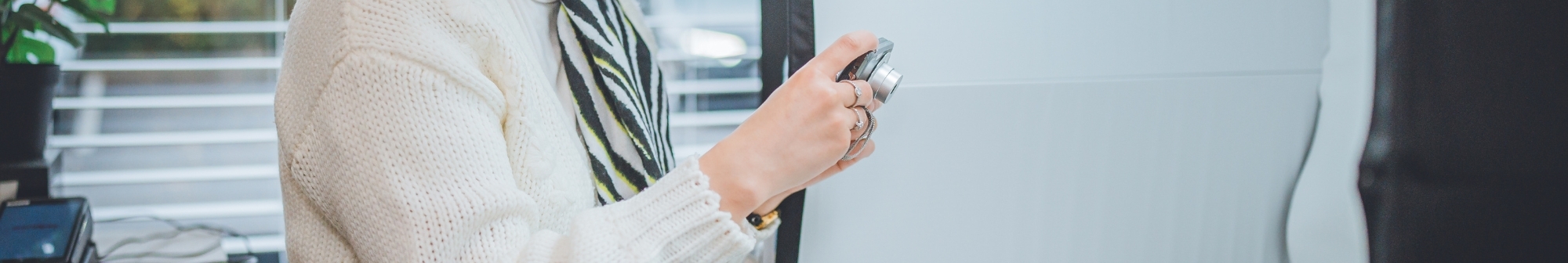 online-listing-volunteer-taking-a-photo-with-a-digital-camera