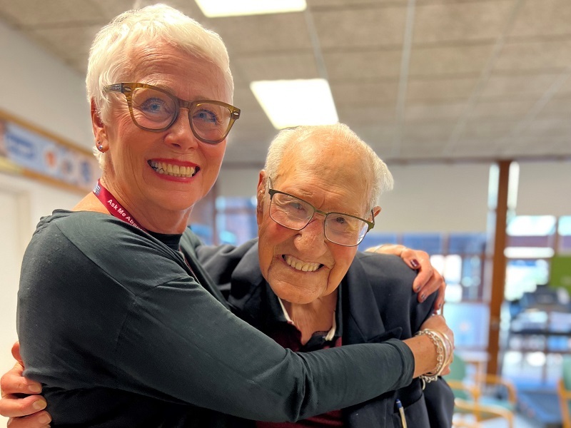 compassionate-neighbour-carol-hugs-dick