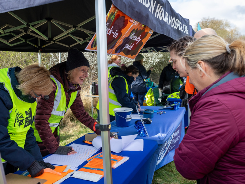 volunteers-check-participants-in-at-muddy-mayhem