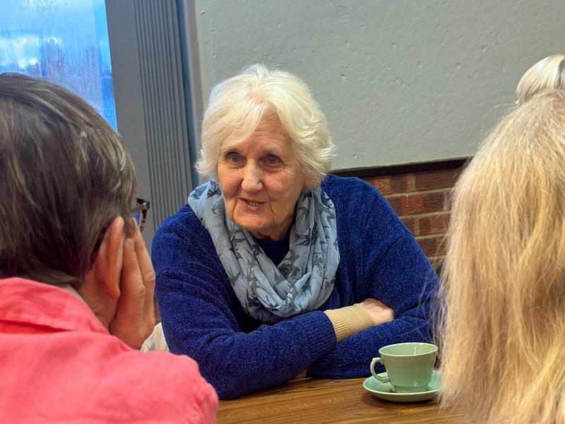 community-members-chatting-over-tea-at-the-hitchin-wellbeing-hub