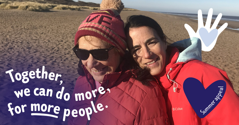two-people-on-a-beach-overlaid-with-text-reading-together-we-can-do-more-for-more-people