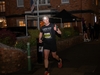 man-wearing-headtorch-running-in-the-dark-at-the-flawed-hero-marathon