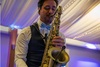 musician-playing-saxophone-at-the-sparkling-ball