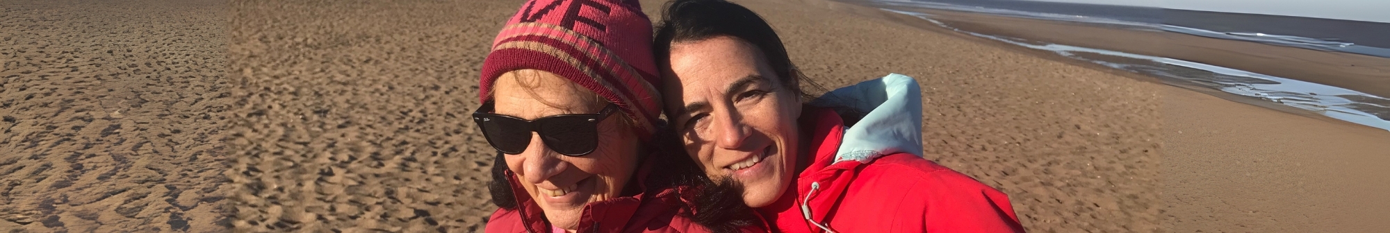 june-and-daughter-jules-smiling-on-the-beach