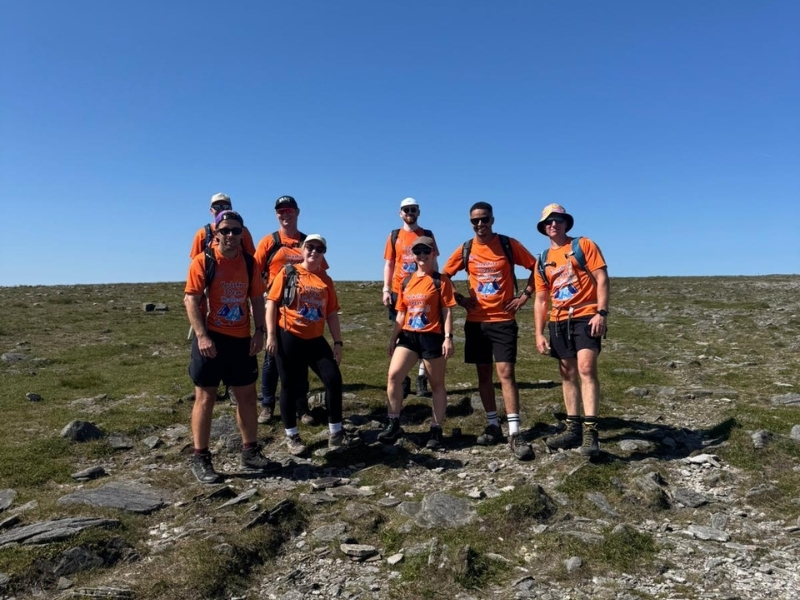 a-group-wearing-matching-orange-t-shirts-on-the-yorkshire-three-peaks-challenge