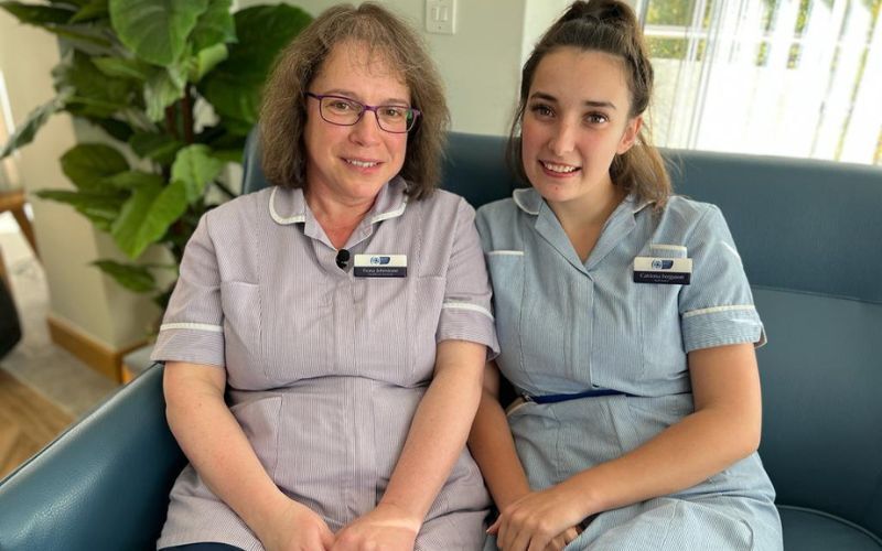 two-nurses-sit-together