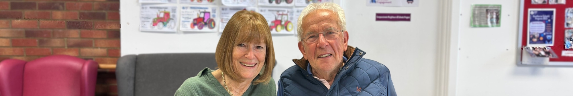 cathy-and-geoff-smiling-at-the-healthy-memory-cafe