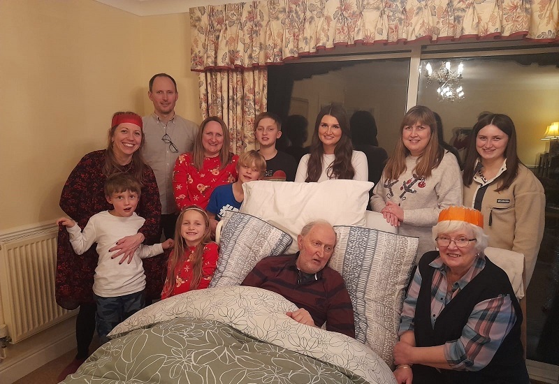 marley-family-on-christmas-day-around-christophers-bed