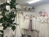 childrens-bridal-gowns-hanging-outside-a-changing-room