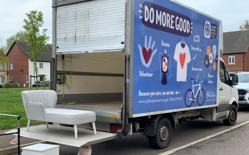 a-sofa-being-loaded-onto-a-van