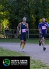 two-runners-at-standalone-10k-one-wearing-team-garden-house-top