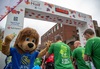 lion-mascot-cheers-at-royal-parks-half-marathon-finish-line
