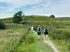 two-people-walking-on-yorkshire-three-peaks-challenge